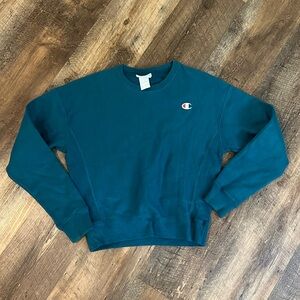A Turquoise Champion Crewneck Sweater